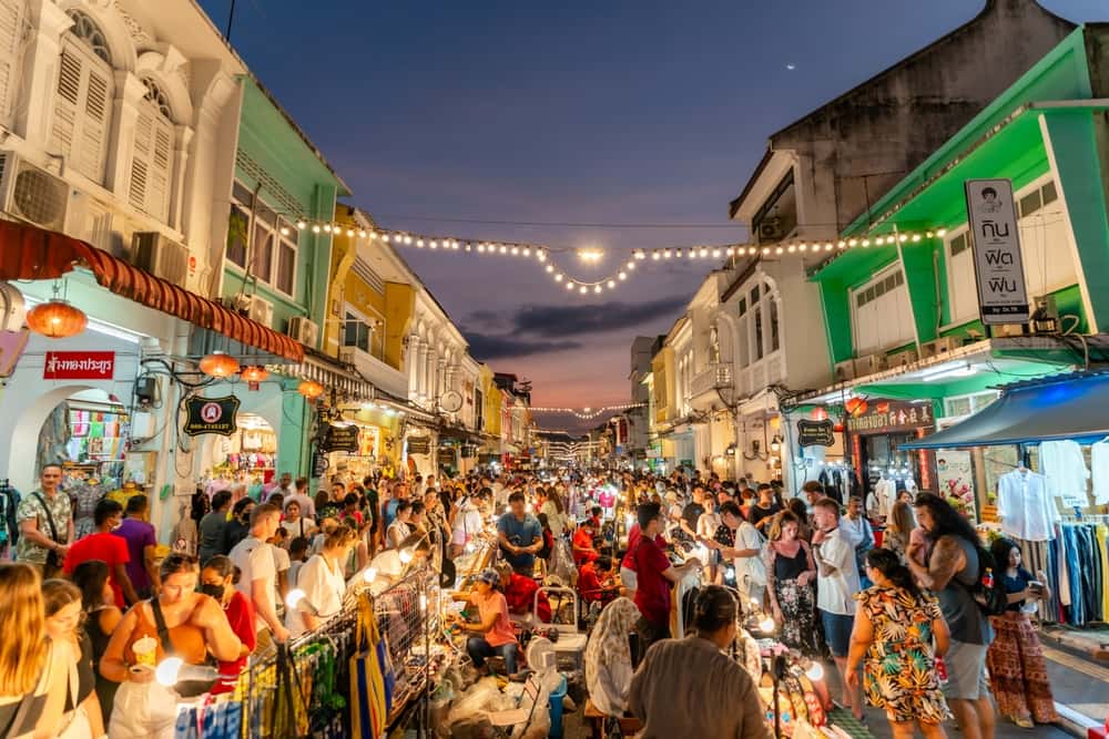 Explore a night market in Thailand