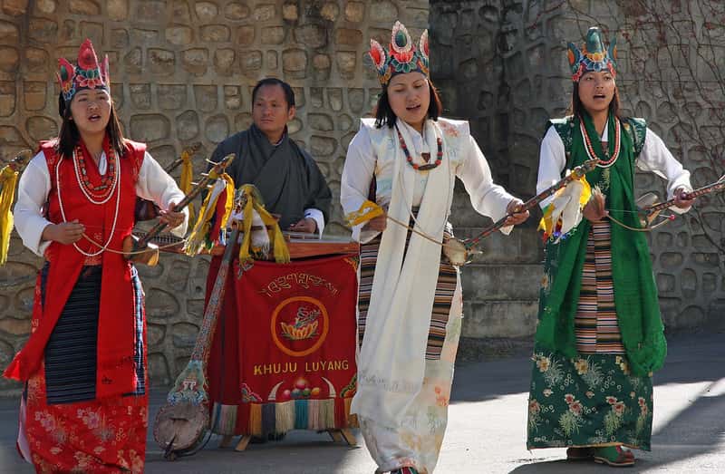 Enjoy A Live Performance Of Khuju Luyang in Bhutan Group Tours